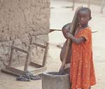 Child pounding fufu